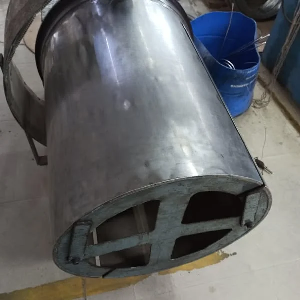 A metal recoiler drum showing its cylindrical body and internal supports.