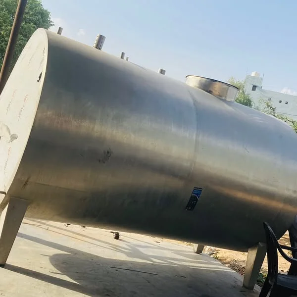 A large horizontal stainless steel tank supported on metal legs.